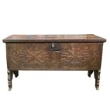 A 17th century boarded oak coffer, probably West Country.