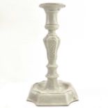 A pearlware moulded candlestick, circa 1810.