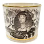 A Queen Charlotte Memorium small porcelain mug.