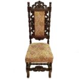 A 17th century style oak side chair.