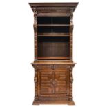 A Victorian oak bookcase cabinet.