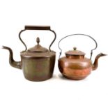 A large copper kettle and lid with acorn finial.