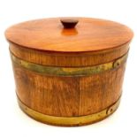 A brass bound coopered teak storage jar and cover.