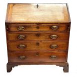 A George III fruitwood bureau.