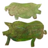 A painted sheet iron pig.