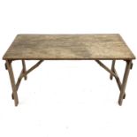 An ash folding trestle table.