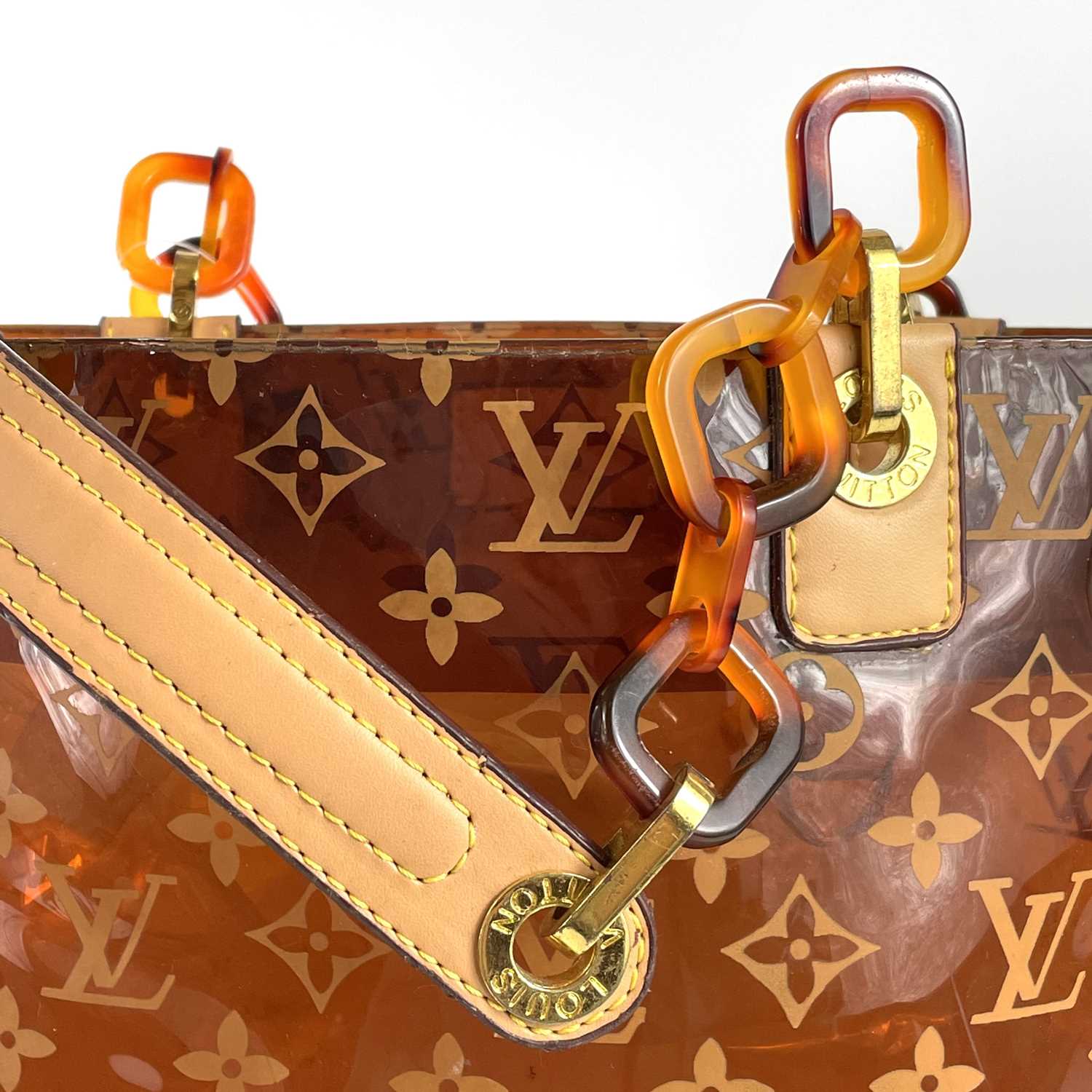 A Louis Vuitton leather and plastic shopper bag. - Image 5 of 18