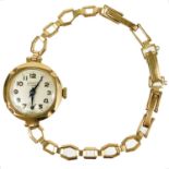 A 9ct gold ladies manual wind bracelet wristwatch.