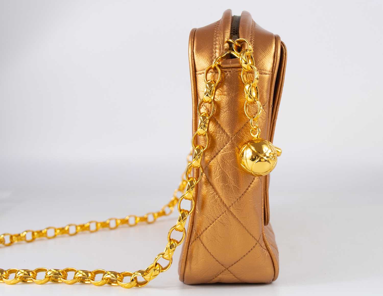 A Chanel gold quilted leather turn lock camera bag. - Image 3 of 10