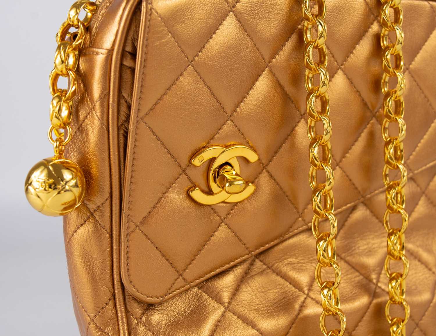 A Chanel gold quilted leather turn lock camera bag. - Image 4 of 10