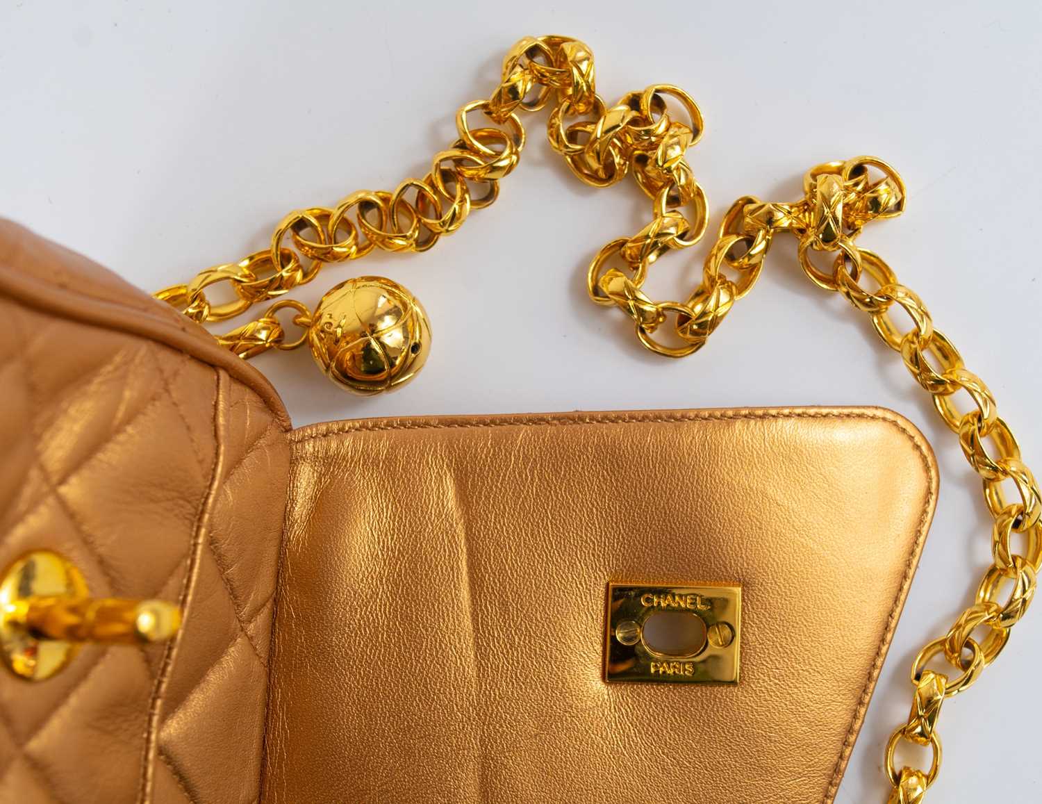 A Chanel gold quilted leather turn lock camera bag. - Image 6 of 10