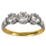 An 18ct gold and platinum diamond set three stone ring.