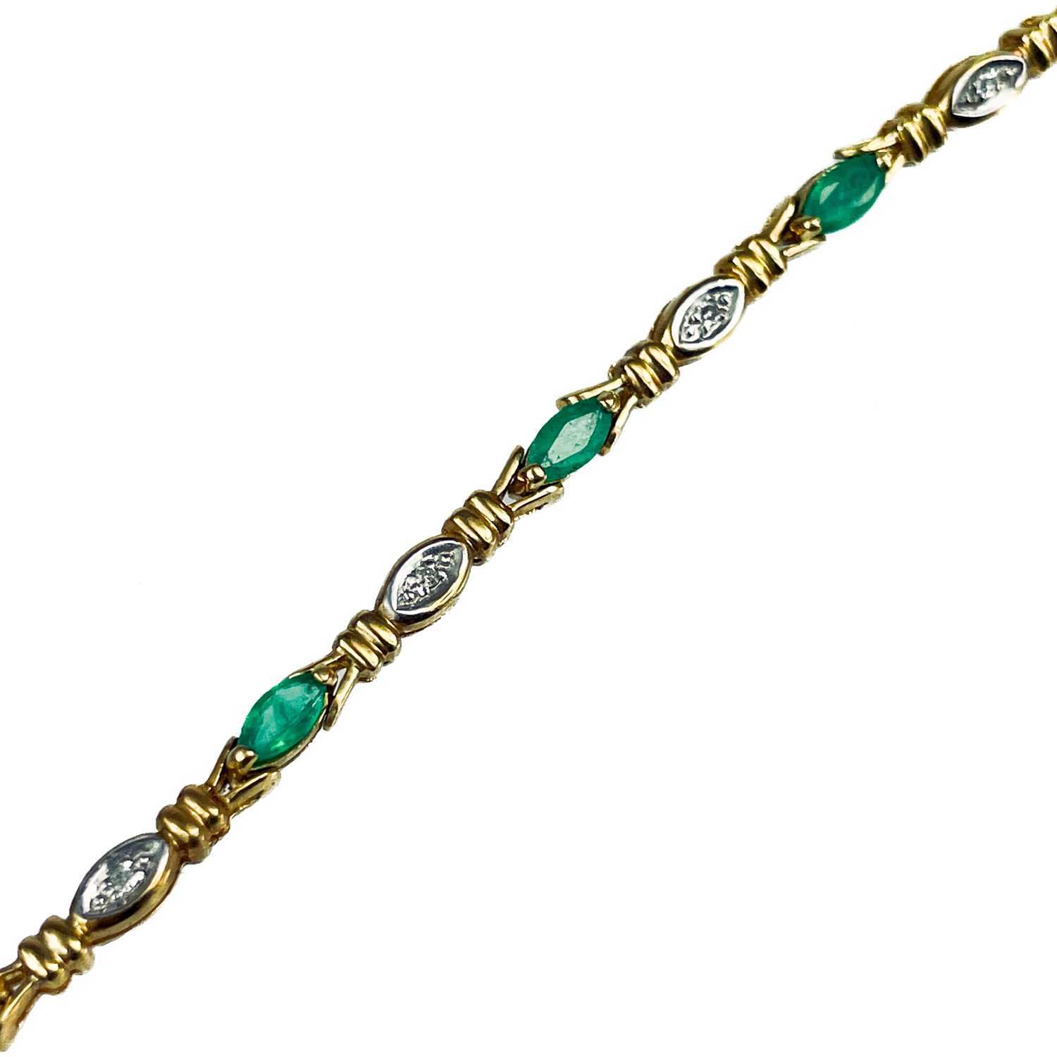 A modern 9ct gold diamond and emerald set bracelet. - Image 6 of 10
