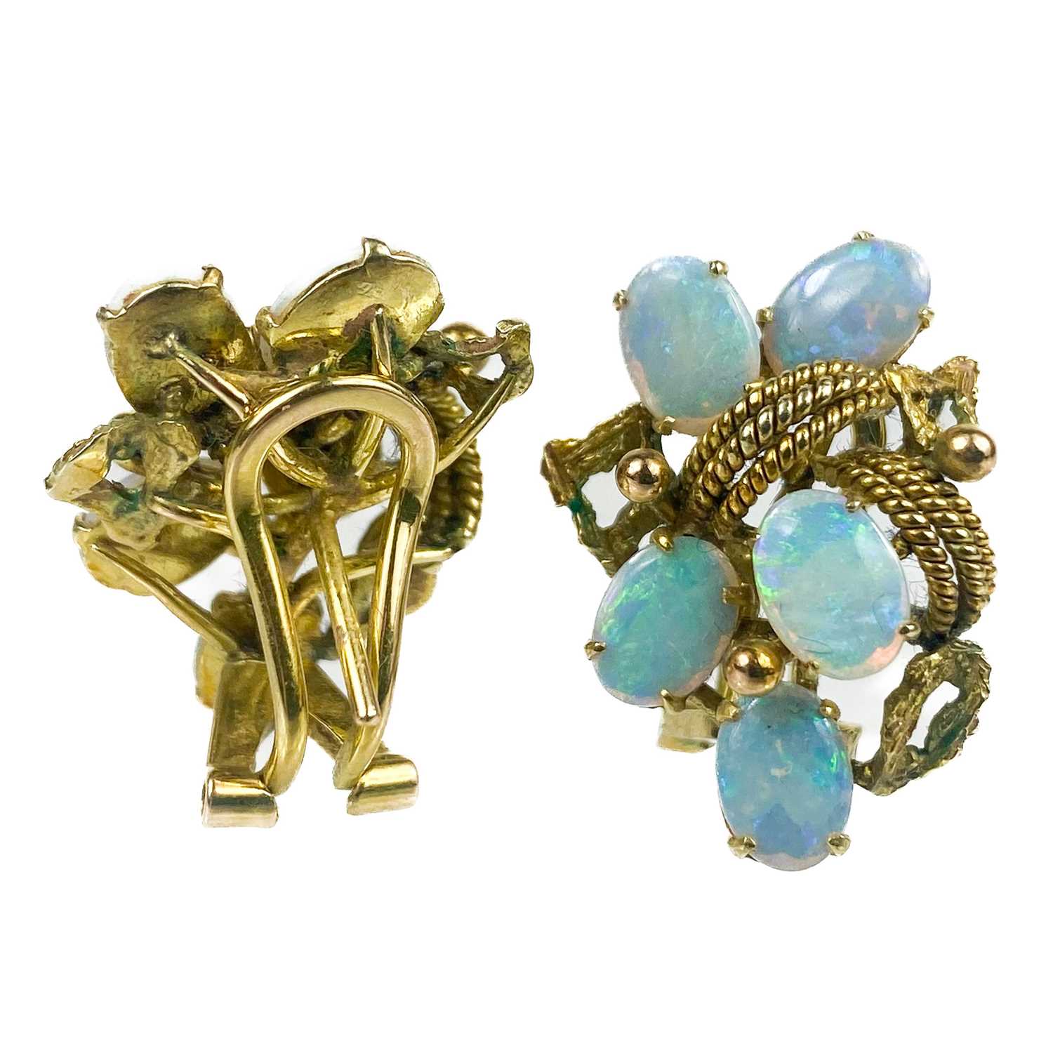 A pair of 18ct gold opal set openwork stud earrings.