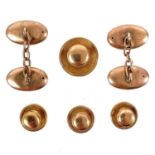 An Edwardian cased six piece 9ct rose gold cuff links and studs.