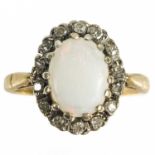 A modern 9ct white opal and diamond set cluster ring.