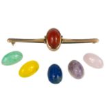 A 9ct gold 'The Chameleon' interchangeable stone bar brooch.
