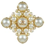 A Chanel faux pearl diamond shaped brooch.