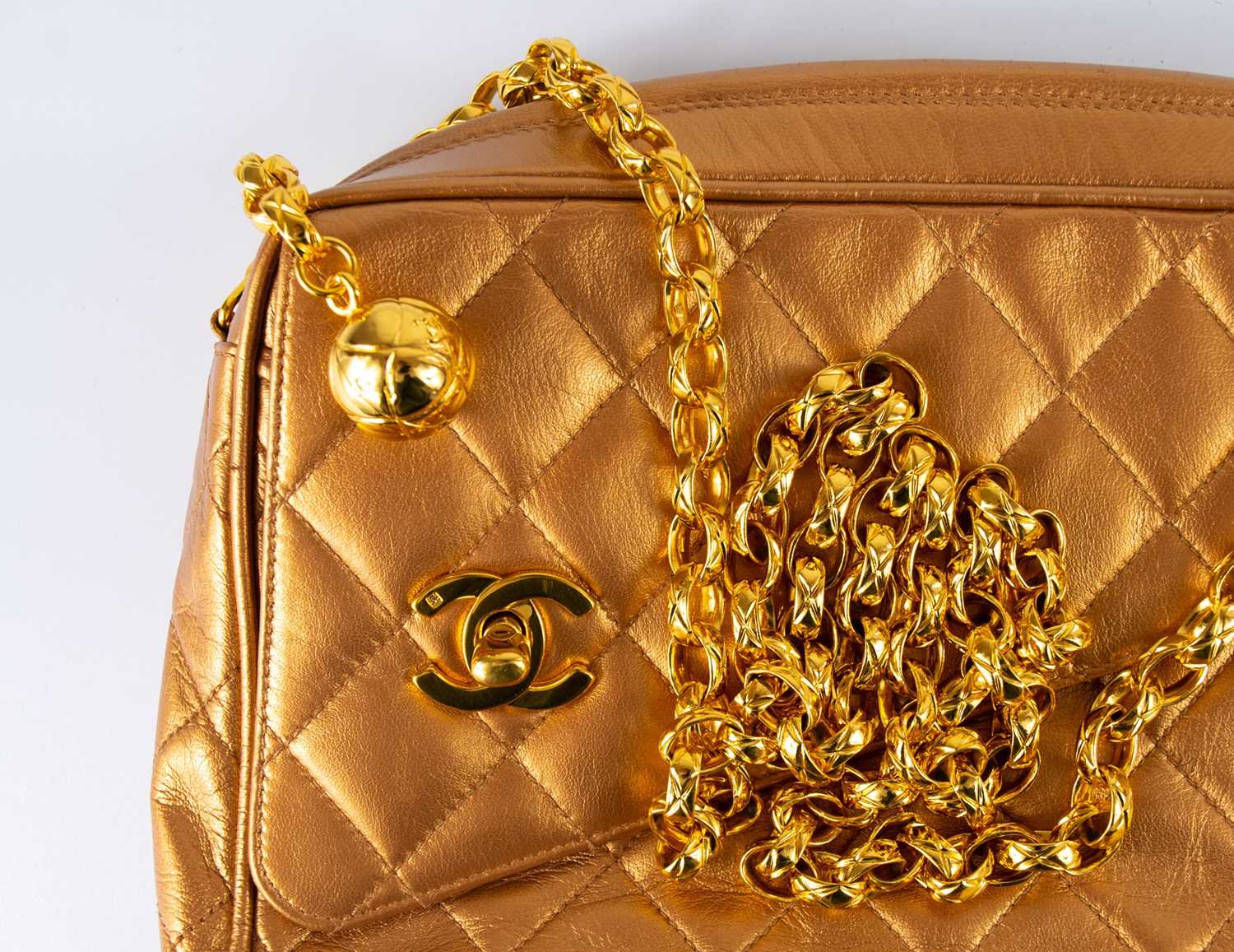 A Chanel gold quilted leather turn lock camera bag. - Image 9 of 10