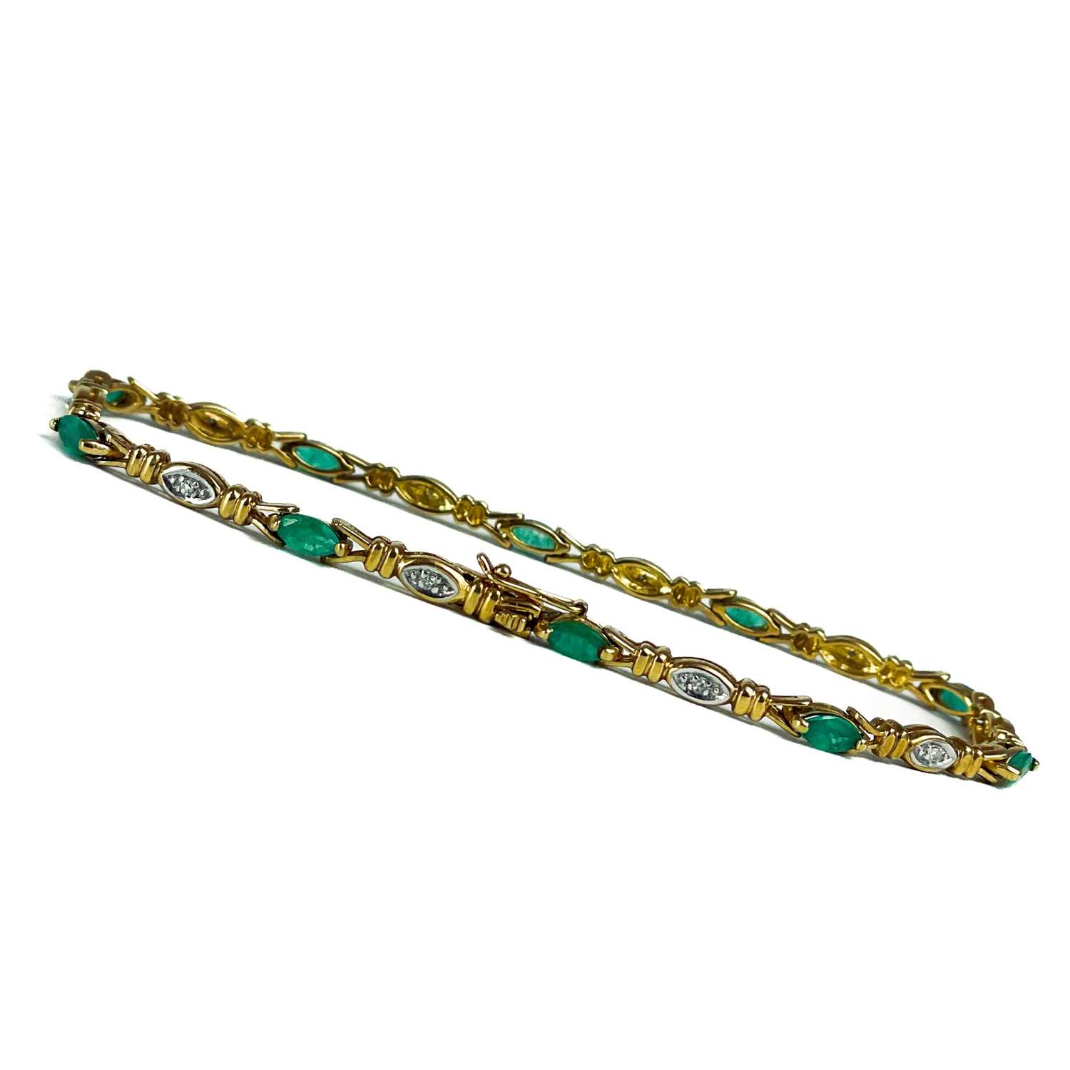 A modern 9ct gold diamond and emerald set bracelet. - Image 7 of 10