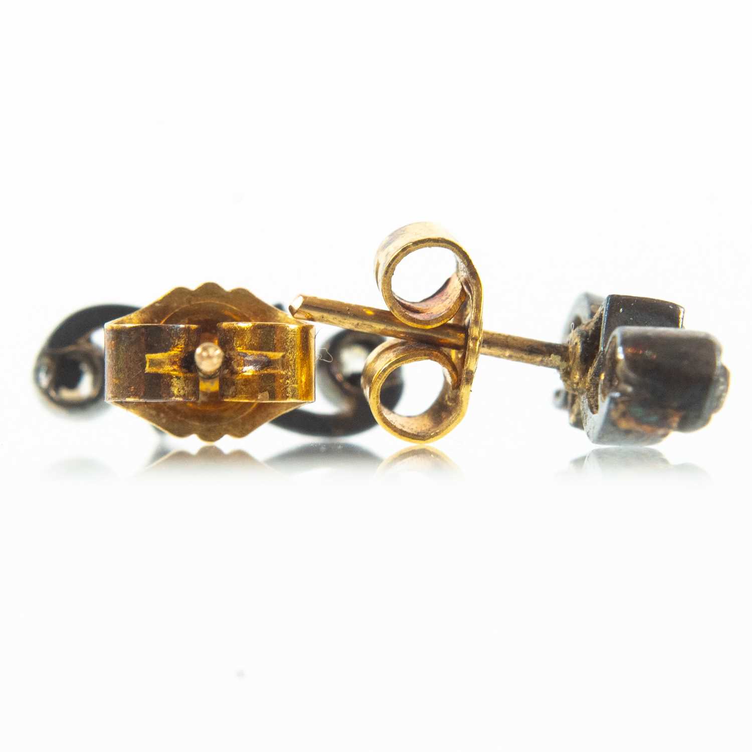 A pair of early 20th century bi-colour gold and diamond set stud earrings. - Image 5 of 6