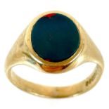 A 9ct gold blood stone set gentleman's signet ring.