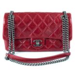 A Chanel ox blood quilted lambskin leather single flap bag with turn-lock.