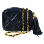 A Chanel navy lambskin leather camera bag.