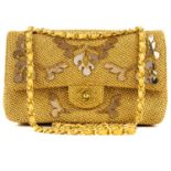 A Chanel gold woven raffia 'Cruise Collection' medium classic double flap bag.
