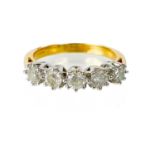 A modern 18ct gold diamond set five stone ring.