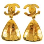 A pair of Chanel gold tone pendant clip earrings.