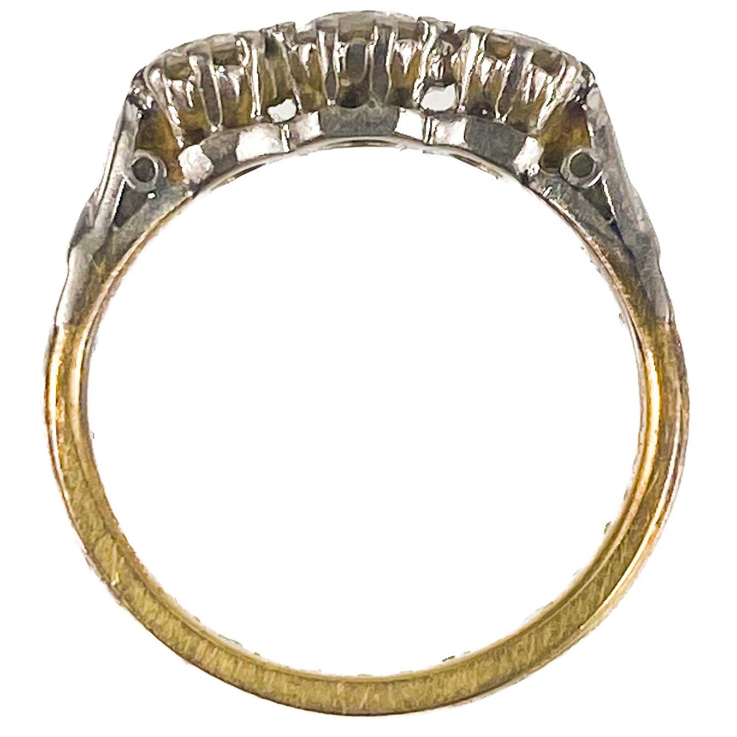 An 18ct gold and platinum diamond set three stone ring. - Image 4 of 6