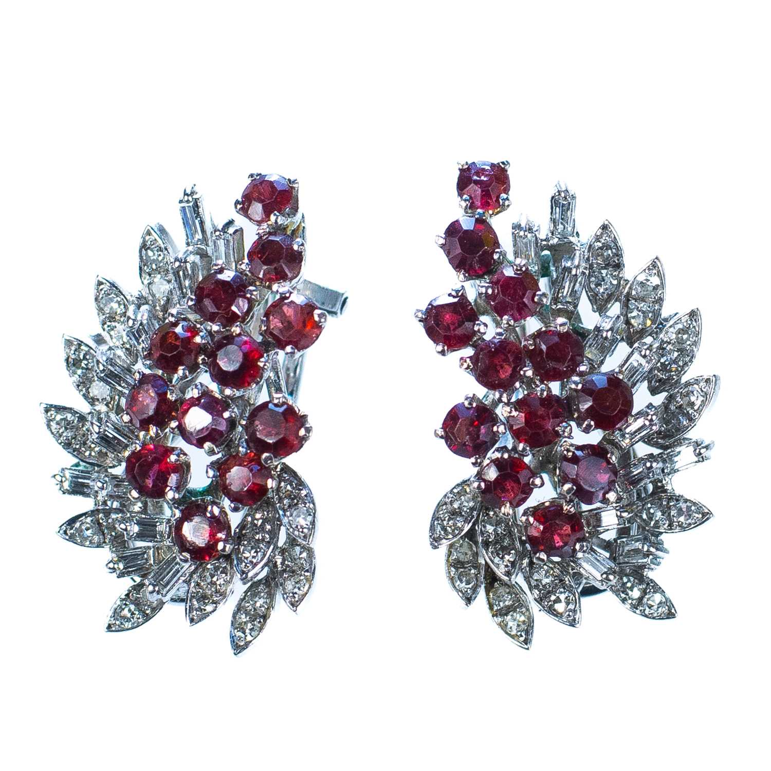 An attractive pair of white gold diamond and ruby clip earrings.