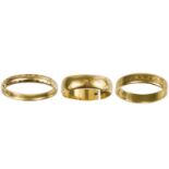 Three 9ct band rings.