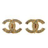 A pair of Chanel CC gold plated crystal set clip earrings.