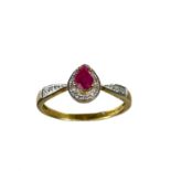 A modern 9ct diamond and ruby cluster ring.