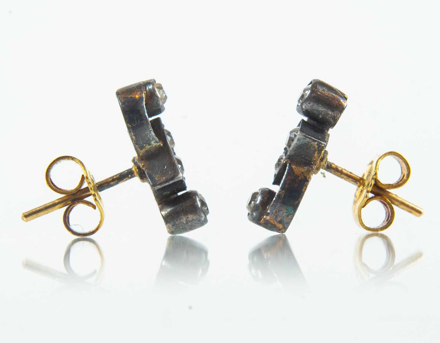 A pair of early 20th century bi-colour gold and diamond set stud earrings. - Image 2 of 6