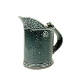 A small salt glazed studio pottery jug by Wally Keeler.