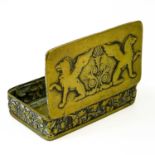 An 18th century brass snuff box with repousse Griffins and foliate frieze panel.