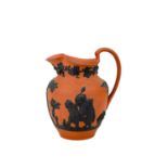 A Wedgwood Rosso Antico jug.