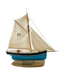 A small model of a St Ives fishing smack.