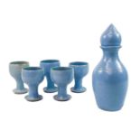 A decanter and five goblets by St Nectans pottery.