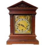 A late 19th century Winterhalder and Hofmeier oak cased mantle clock.