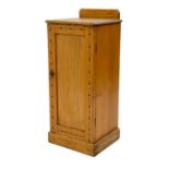 A late Victorian ash pot cupboard with unusual crossband decoration.