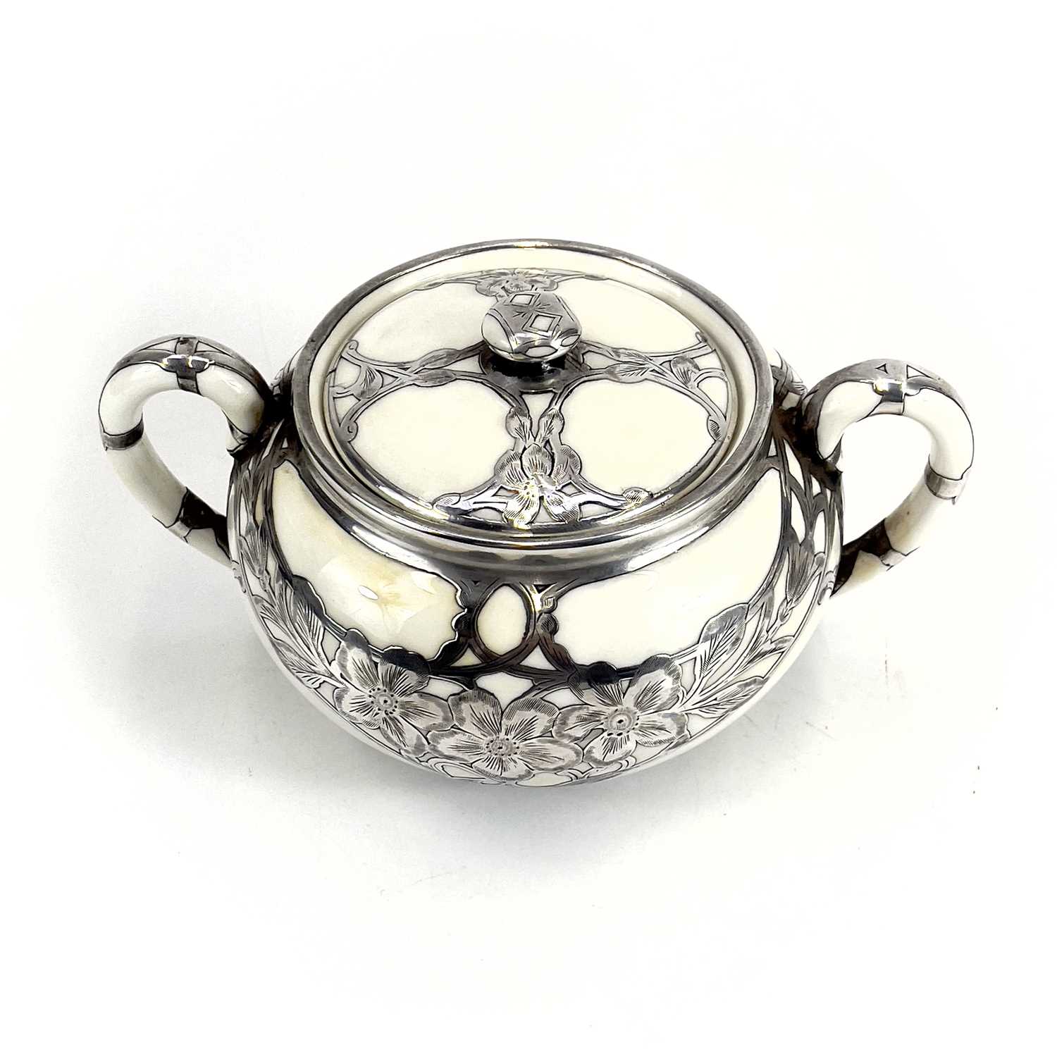 A Royal Doulton white glazed silver overlaid three-piece tea service. - Image 12 of 13