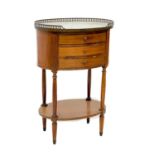 A French style mahogany oval marble top bedside table with pierced brass gallery.