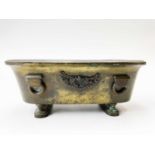 A gilt bronze Regency grand tour inkstand of sarcophagus form.