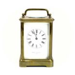 A French brass carriage clock.