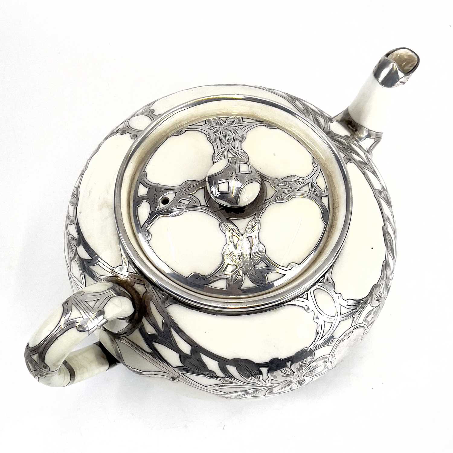 A Royal Doulton white glazed silver overlaid three-piece tea service. - Image 4 of 13