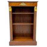 An Empire style low mahogany bookcase.